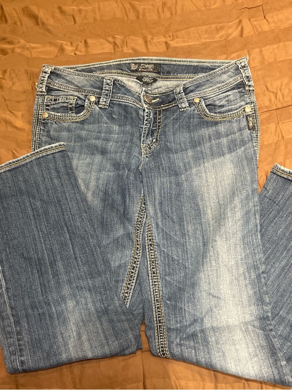Silver Jeans Women's Light-Mid Wash Bootcut Denim